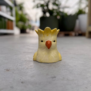 Small yellow bird plant pot